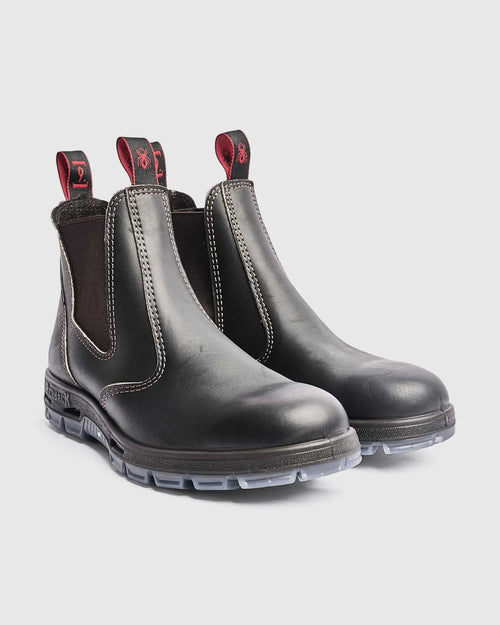 pair of dark brown leather chelsea boots