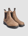 Pair of smart brown chelsea leather lifestyle boots on a light gray background
